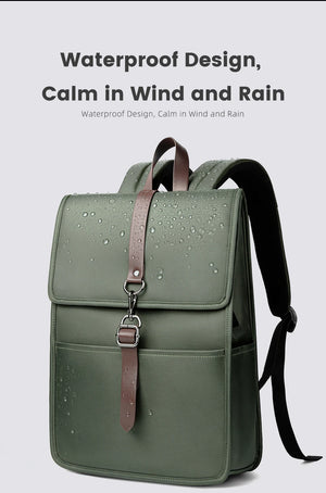 Green waterproof commuter backpack with front flap, shoulder strap, and brown pull tab