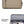 Beige laptop bag with front organizer panel and rolled storage accessory