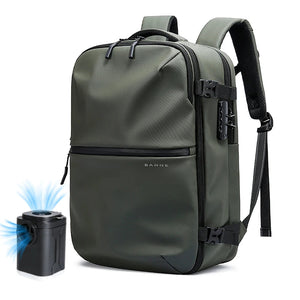Green vacuum compression waterproof travel backpack with side buckles and shoulder strap