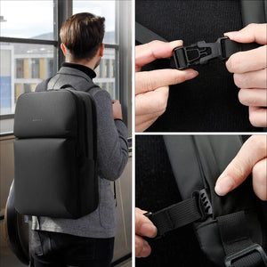 Black backpack worn on back with adjustable strap and side buckle detail