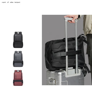 Black travel backpack with luggage strap and zip front pocket compartments