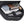 Open black backpack interior with devices and documents in padded compartments