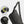 Black crossbody bag with detachable rotating buckle and magnetic snap closure detail.