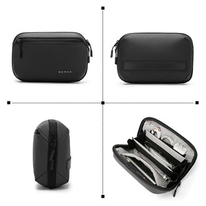 Black waterproof tech storage bag with front pocket and open organizer compartments