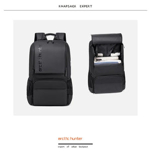 Black travel backpack with front zip pocket and open interior compartment view