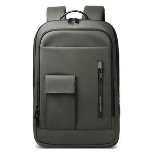 Lightweight waterproof compact backpack in green with front zip pocket and vertical side zipper.