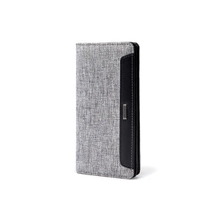 Grey long bifold wallet with textured exterior and slim front card slot panel.