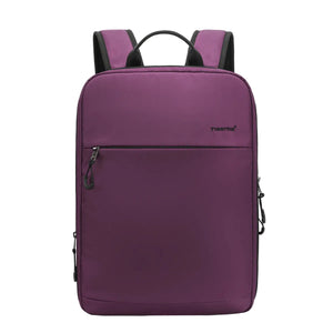 Purple compact waterproof backpack front view with zippered pocket and top handles