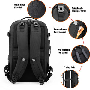 Black waterproof travel backpack back view with padded shoulder straps and trolley belt