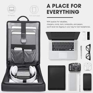Black backpack with open organizer pockets for laptop accessories and chargers