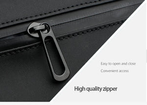 Black zipper on stitched edge of messenger bag, easy open and close pull
