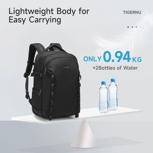 Black lightweight waterproof travel backpack, compact shape with front buckles and shoulder straps