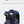 Black backpack with multiple compartments and side zip pockets for large partition storage.