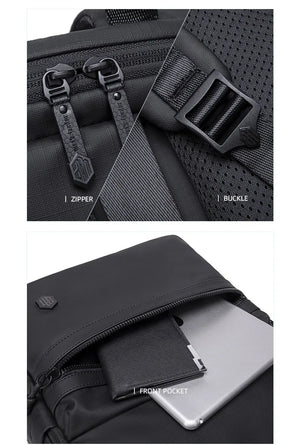 Black bag with zipper, buckle, and front pocket details.