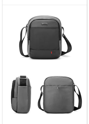 Black compact waterproof messenger bag with front pocket and adjustable shoulder strap