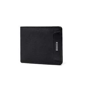 Black minimalist bifold card wallet with fabric texture and slip pocket on the right