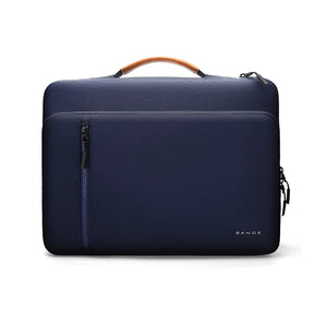 Navy blue laptop bag with brown top handle and zippered front pocket