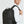 Black large travel backpack with multiple front pockets and side carry handle