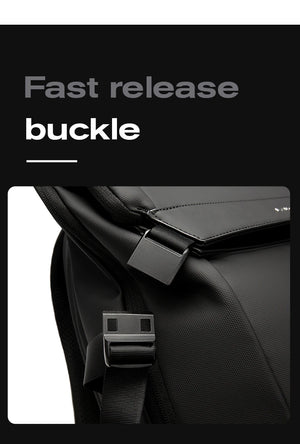 Black backpack with quick-release buckle on a front strap and textured panel