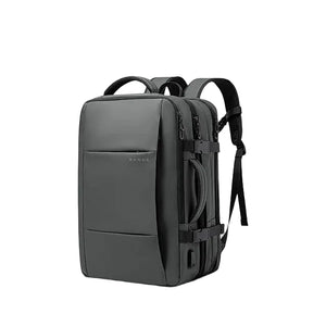 Dark gray backpack with expandable front panel, top handle, and side adjustment buckle