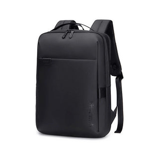Black waterproof travel backpack with top handle and zippered front panel