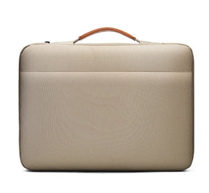 Beige laptop bag with top handle and rounded rectangular shape