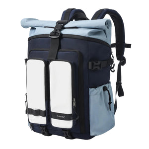 Waterproof travel backpack in blue and black with roll-top, front straps, and carry handle