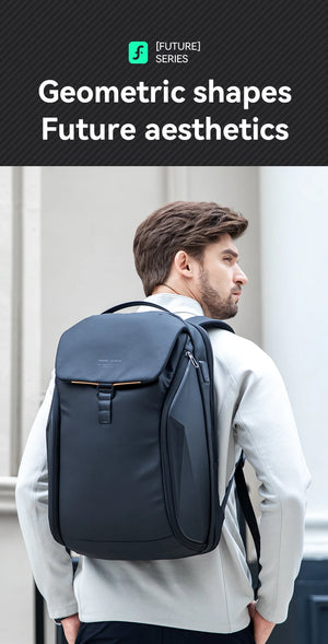 Dark backpack with front flap pocket worn by man, showing rear profile