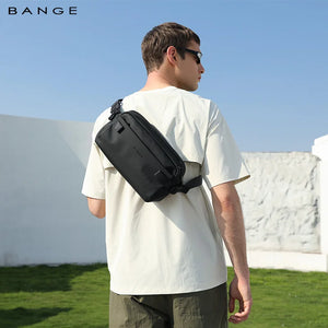 Waterproof crossbody bag worn across the back with dark green adjustable strap