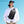 Dark gray waterproof crossbody sling bag worn across chest with front pocket and strap