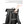 Black backpack with luggage strap for attaching to a suitcase