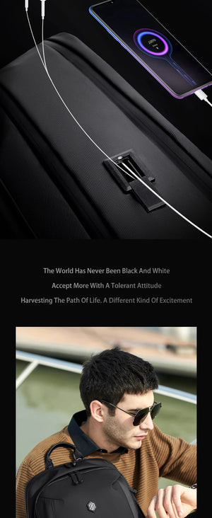 Black backpack with hidden card slot pocket and USB charging cable pass-through
