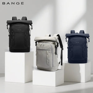 Expandable roll-top waterproof travel backpack in black, light gray, and navy blue