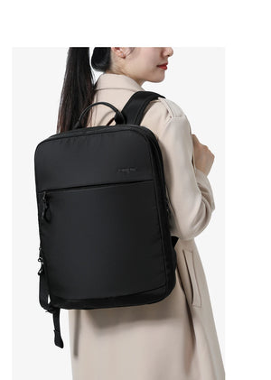 Black compact waterproof backpack with zippered front panel and adjustable shoulder straps
