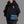 Blue crossbody bag with flap front and adjustable shoulder strap