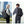 Black travel backpack worn by people with front and side profile