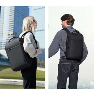 Black travel backpack worn by people with front and side profile