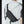 Black waterproof crossbody sling bag worn, side view with zip and strap