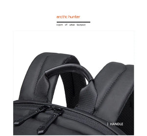 Black backpack handle with 'Arctic Hunter' branding on a white background