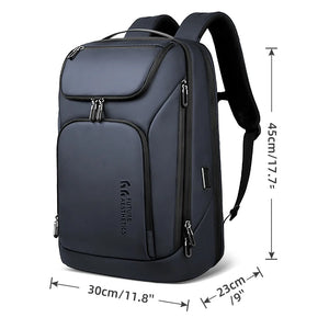 Large blue backpack with front zip pockets, top flap pocket, and padded shoulder straps