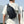 Lightweight waterproof crossbody bag, dark blue, worn across chest with shoulder strap