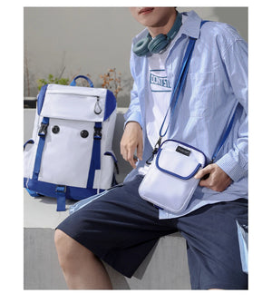 White and blue detachable waterproof backpack with crossbody small bag, carried by person