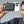 Black leather MagSafe card holder wallet on phone, showing front card pocket