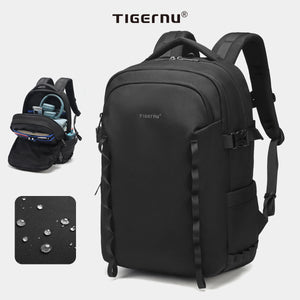 Black waterproof travel backpack with front zip pocket and water-repellent finish