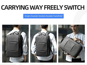 Waterproof travel backpack shown worn on back and carried by hand with shoulder straps
