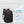 Lightweight black waterproof backpack with carry handle and slim front profile