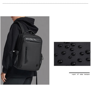 Black travel backpack with textured fabric and front vertical zipper pocket