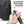 Black sling bag with side zip pocket and retractable keychain clip