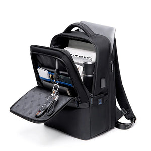 Black waterproof travel backpack with front organizer and open top compartment