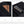 Black waterproof travel backpack with zip pocket and clamshell opening